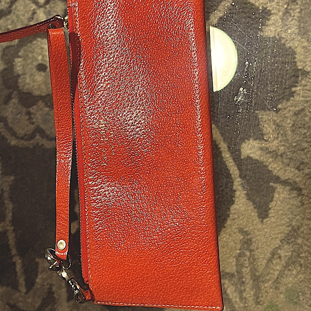 Orange, leather zip bag